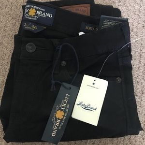 NWT black mid-rise jeans